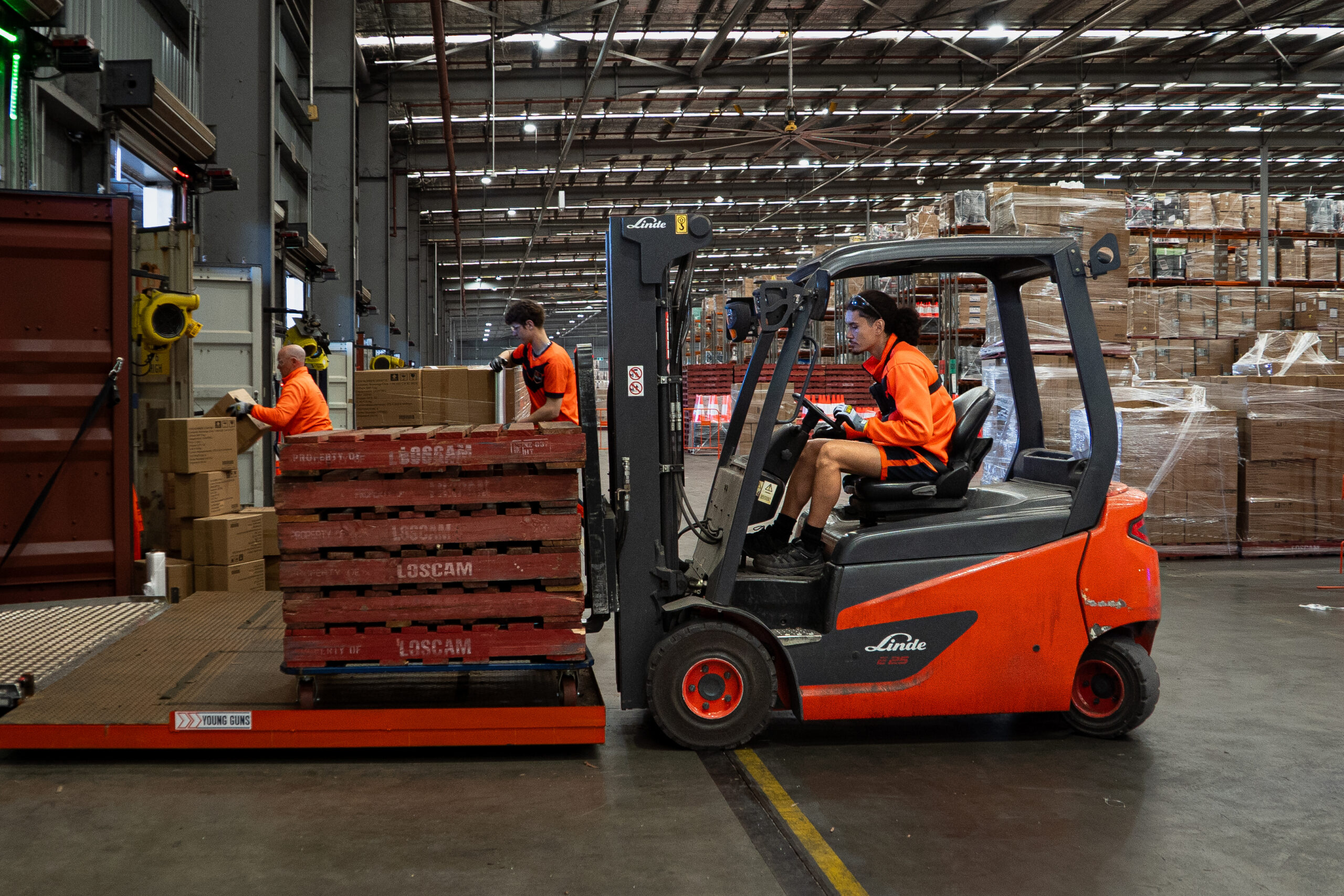 Man on forklift in warehouse